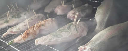 Chicken smoking on a Smoky Jo's course at the Wild Boar